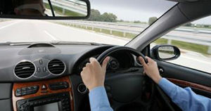 hands on steering wheel